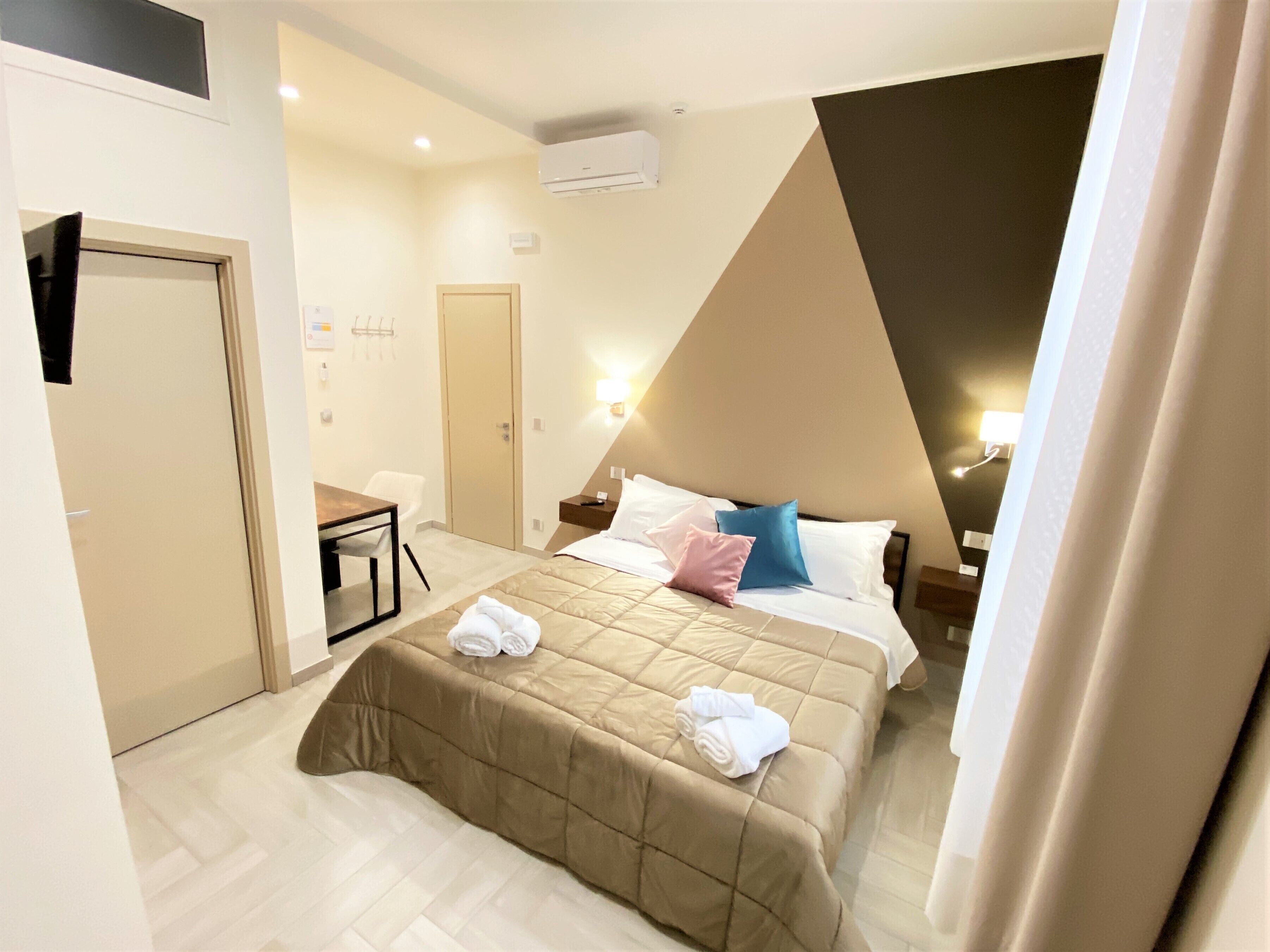 Memory foam beds, minibar, desk, laptop workspace