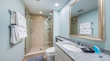 Shower, hair dryer, towels, soap