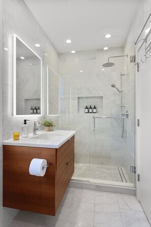 Combined shower/bathtub, hair dryer