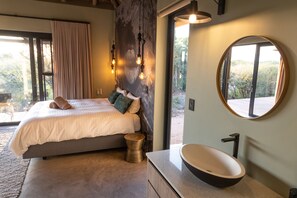 Master bedroom 1 with ensuite bathroom and outside shower