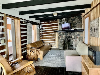 Rustic log cabin built in the 1900's! On Private Lake with Great Fishing.