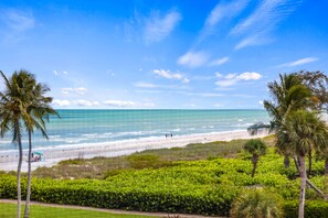On the beach, sun-loungers, beach towels