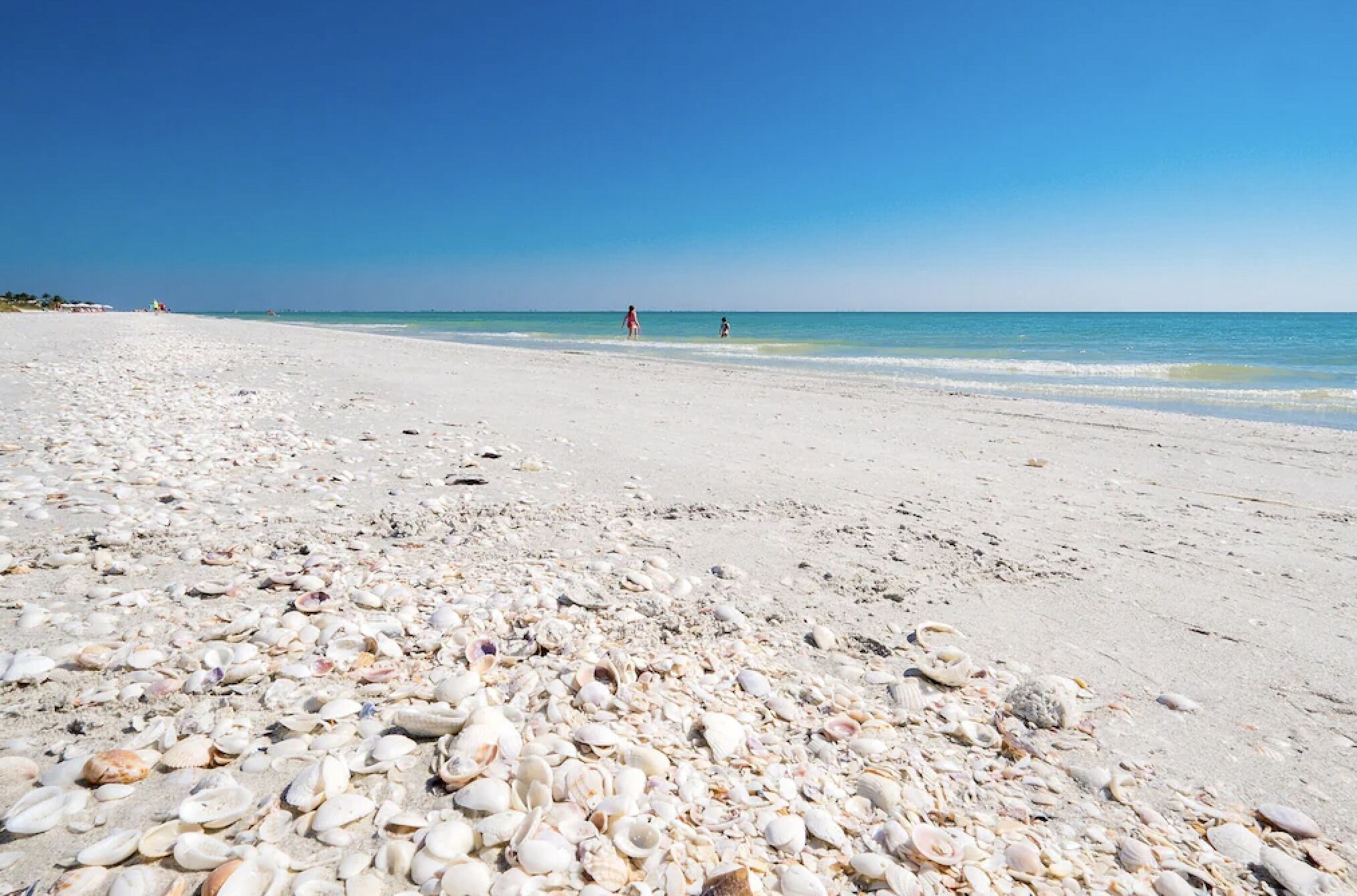 On the beach, sun loungers, beach towels