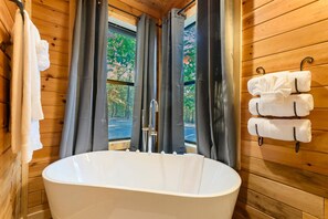 Combined shower/tub, eco-friendly toiletries, hair dryer, towels