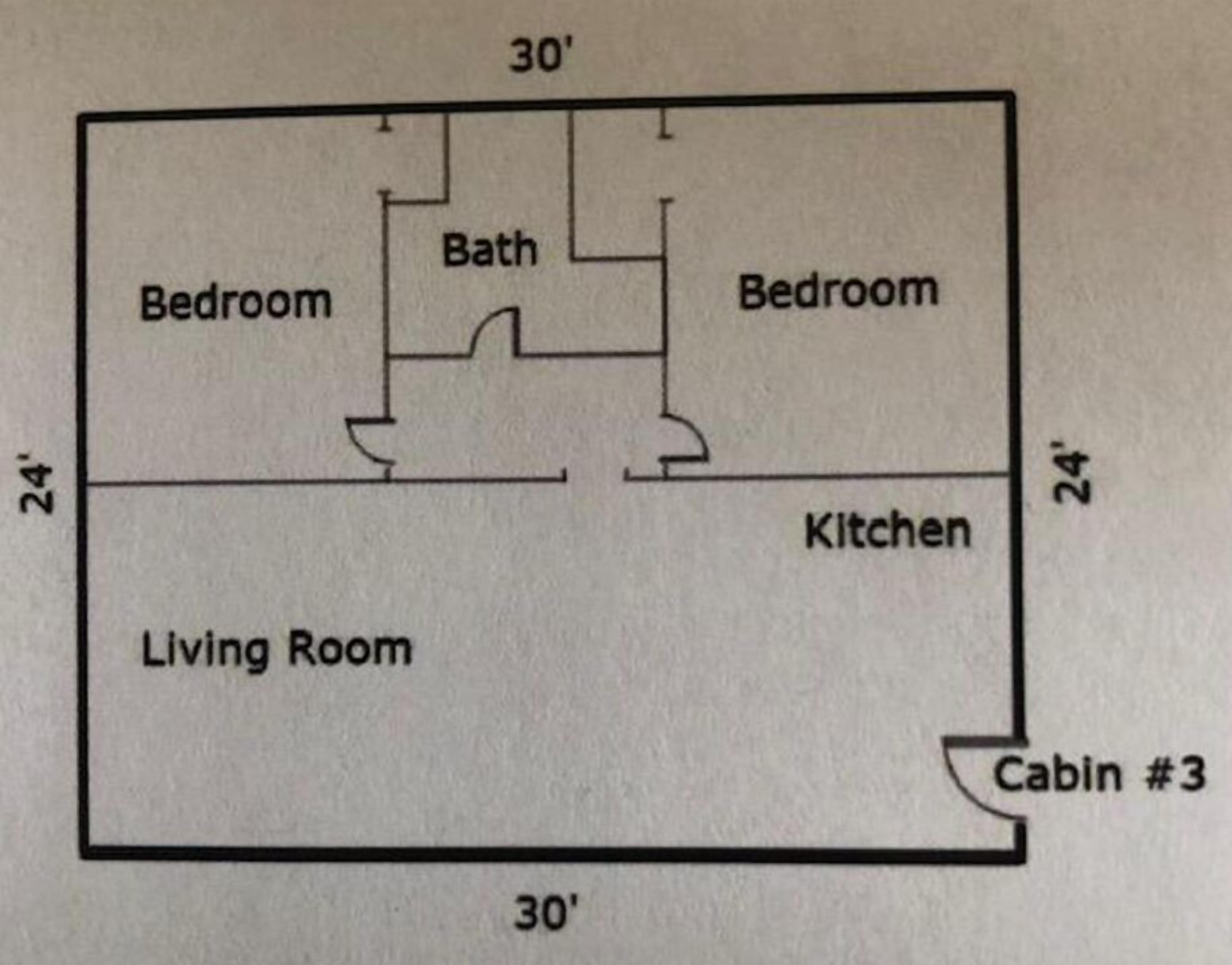 A floor plan with a living room, two bedrooms, a kitchen, a bathroom, and a cabin.