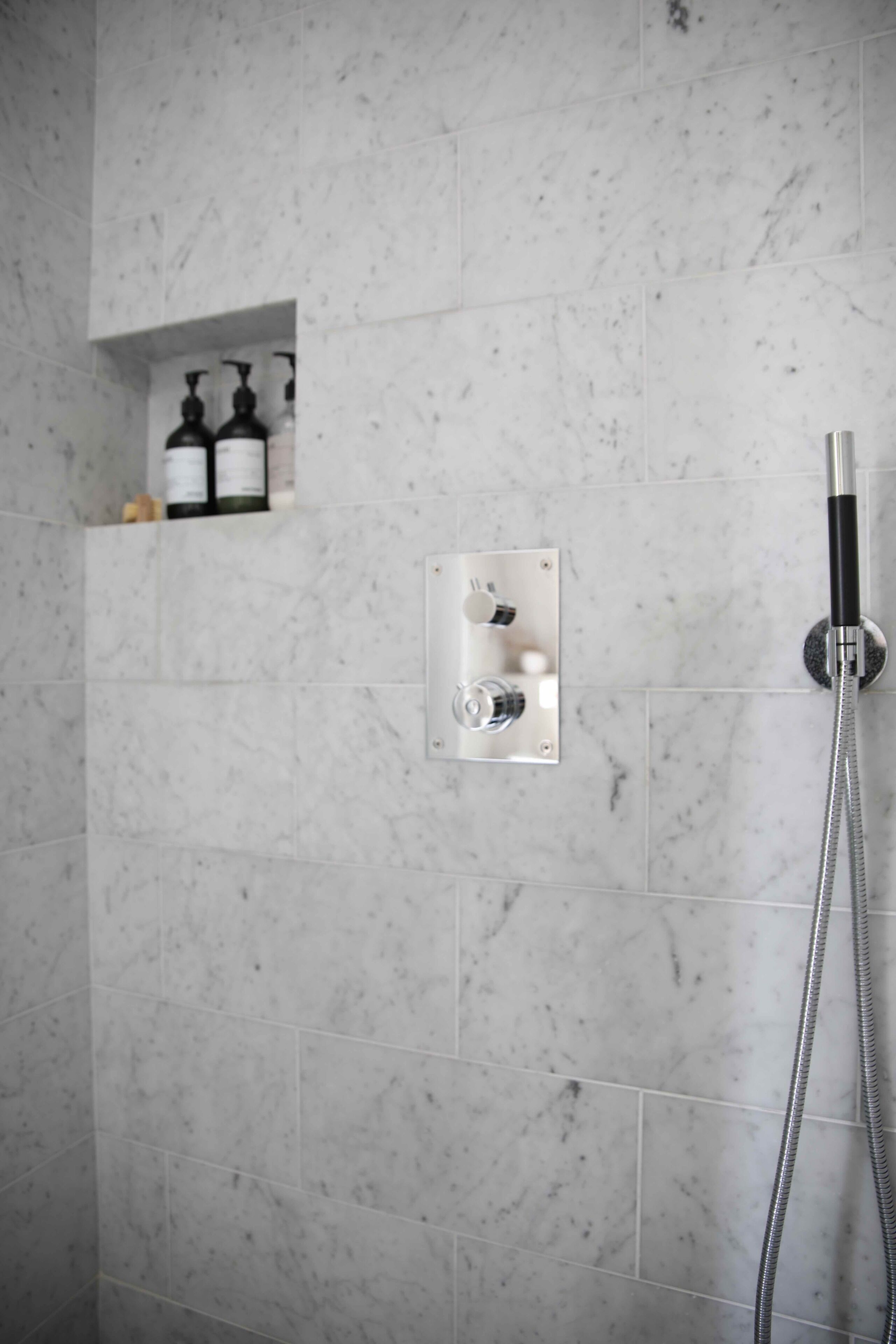 Bathtub, hair dryer, towels, soap