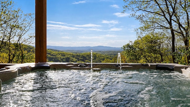 A hot tub with a view of a mountainous landscape. - Modern Mountaintop A-Frame | Wineries, Views, Lake (Morganton)