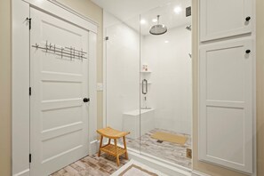 Combined shower/tub, hair dryer, towels, soap