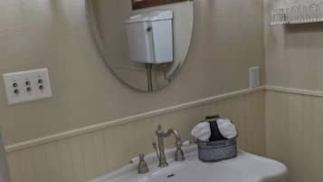 Combined shower/tub, hair dryer, towels, soap