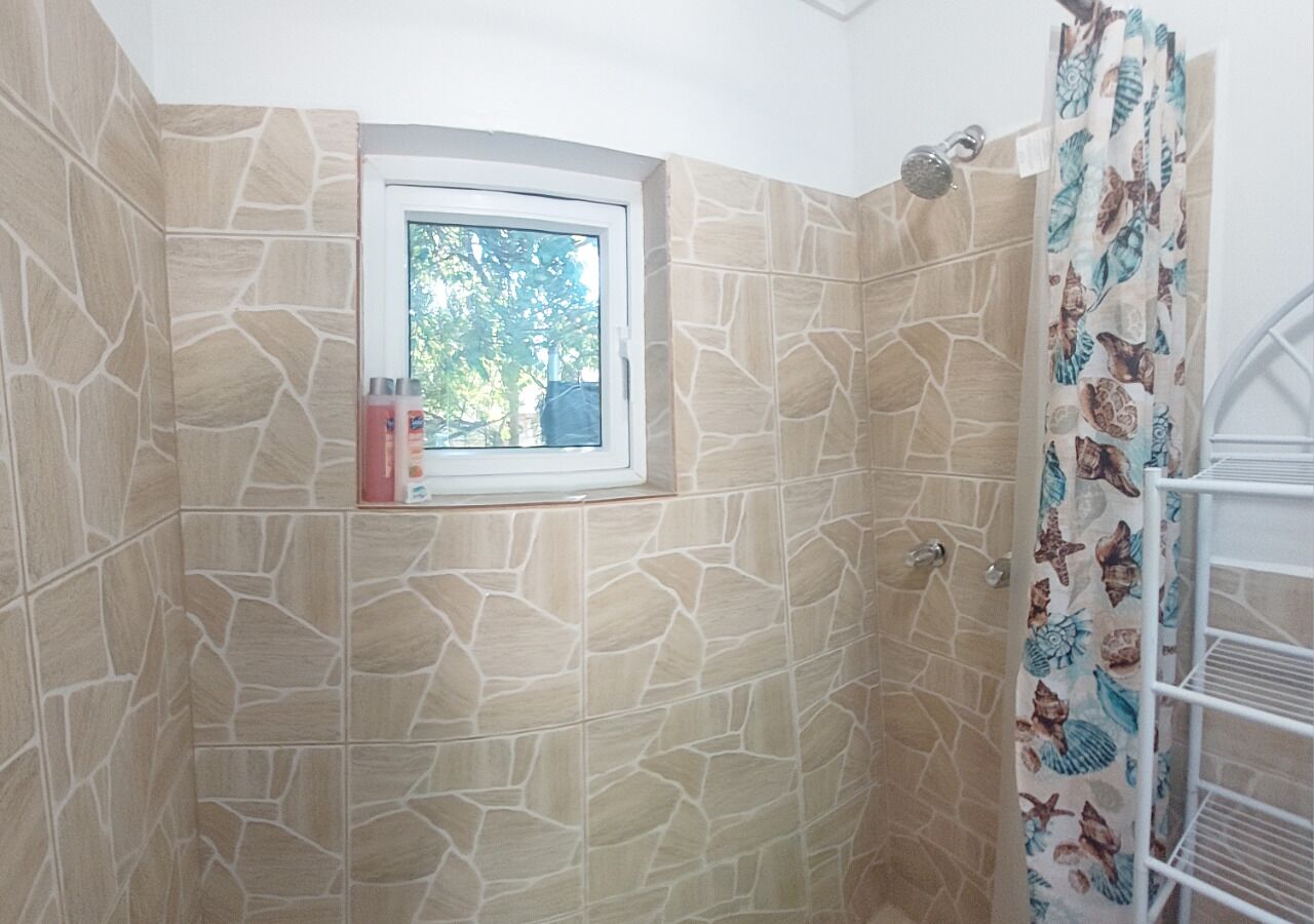 Shower, towels, soap, shampoo