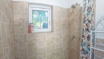Shower, towels, soap, shampoo