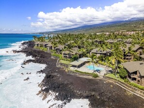 Enjoy ocean access from your villa, surrounded by lush greenery and a scenic mountain view.
