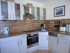 Geladeira, fogão, cooktop, lava-louças