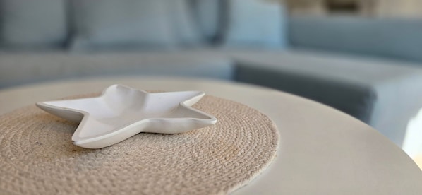 A white star-shaped object on a textured surface.