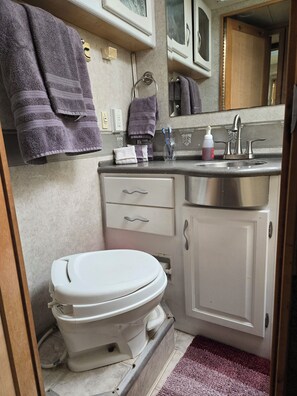 Shower, towels, soap, shampoo