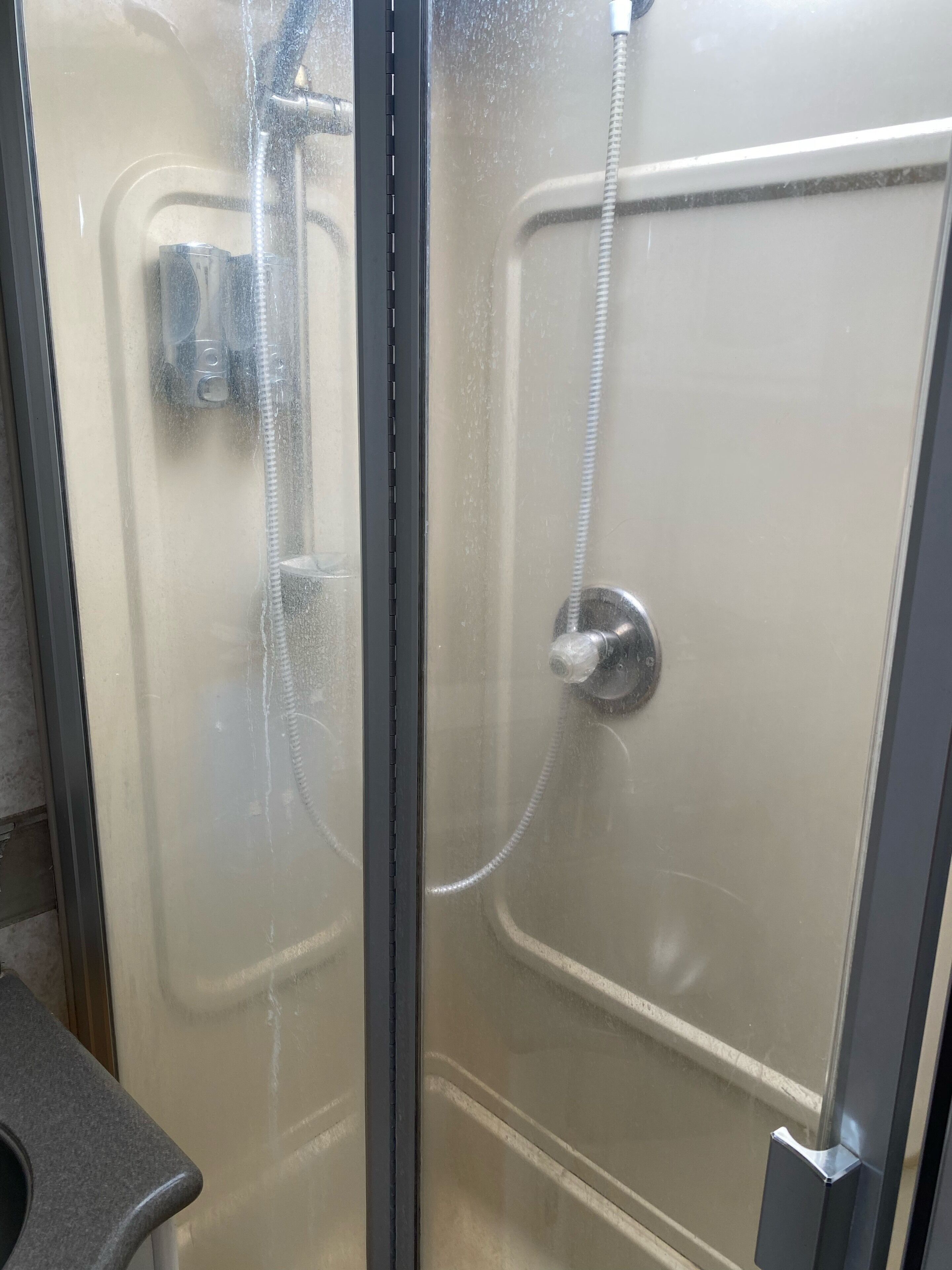 Shower, towels, soap, shampoo