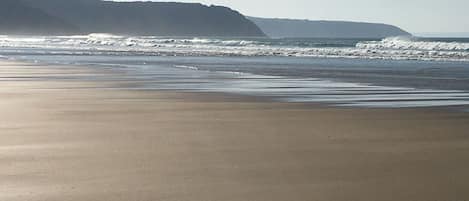 Beach nearby, sun loungers