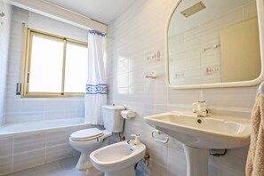 Bathtub, hair dryer