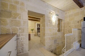 Signature Apartment | Living area | 40-inch LCD TV with satellite channels, TV - Tritoni harbour suites (Valletta)