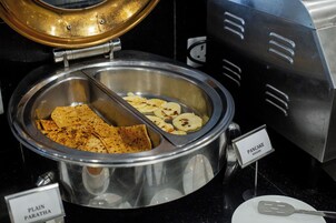 A buffet with labeled sections for 'Pancake' and 'Plain Paratha'.