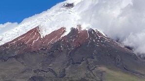 A snow-capped mountain with a clear sky.
