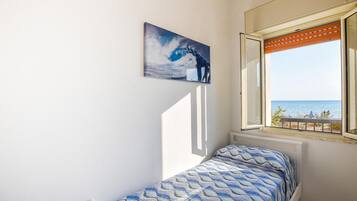 2 camere, culla da viaggio, Wi-Fi gratuito, lenzuola