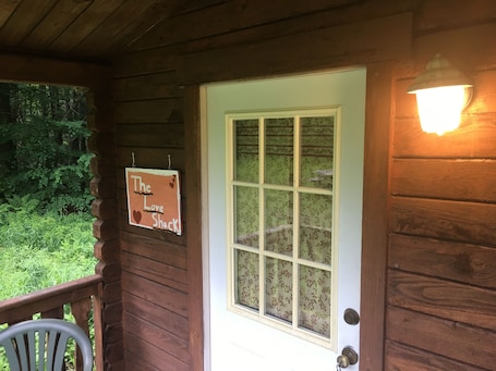 Exterior detail. One Room Log Cabin in beautiful Woodland Campground