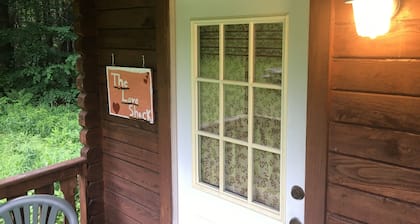 One Room Log Cabin in beautiful Woodland Campground