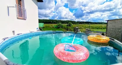 Holiday home by the forest, lake and Baltic Sea – sauna, pool, hot tub