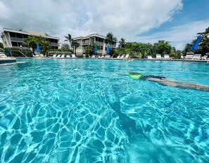 Outdoor pool, a heated pool - Luxury Gulf View Condo + Steps to the Beach (Sanibel)