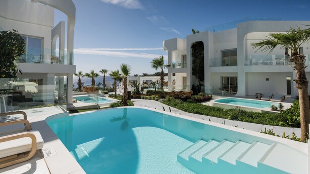 A modern resort with a large infinity pool, multiple swimming pools, and a clear view of the ocean. - Meraki Sharm El Sheikh Resort (Sharm El Sheikh)