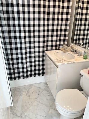Combined shower/tub