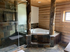 Combined shower/tub, hair dryer, towels, soap