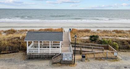 Coastal cottage minutes from the beach. Large front porch for morning sun!!