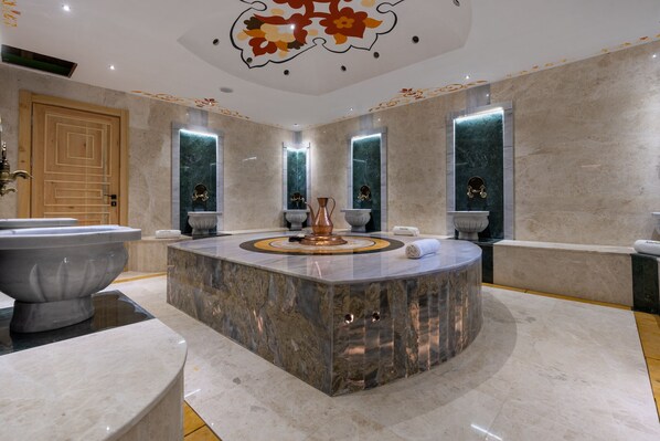 A luxurious bathroom with a marble vanity, a large bathtub, and a decorative ceiling. - Naturelife Bungalows & SPA - Free Access to Odile Hotel (Kemer)