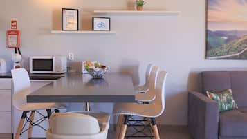 Mini-fridge, microwave, oven, stovetop