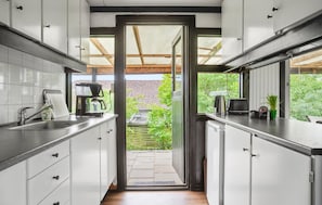Fridge, stovetop, coffee/tea maker