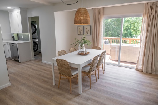 Eating area leading to one pristeen acre looking out to waterfront