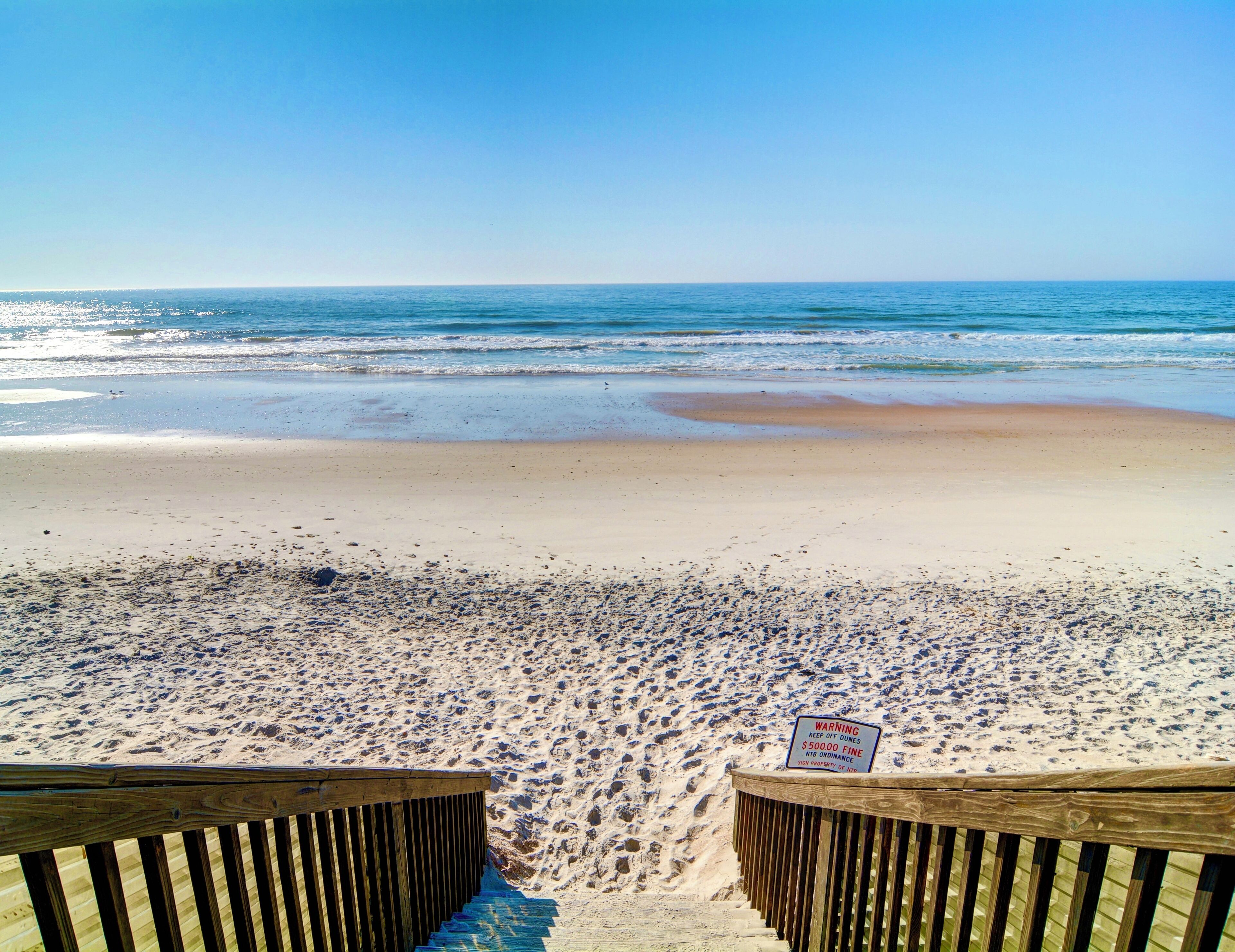 On the beach, sun-loungers, beach towels