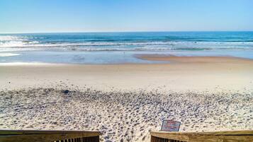 On the beach, sun-loungers, beach towels