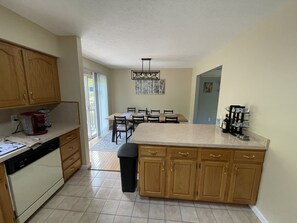 Fridge, microwave, oven, stovetop - Spacious Pocono Home w/ A/C / Hot Tub / FirePit / Gazebo / Playground / Grill (Long Pond)