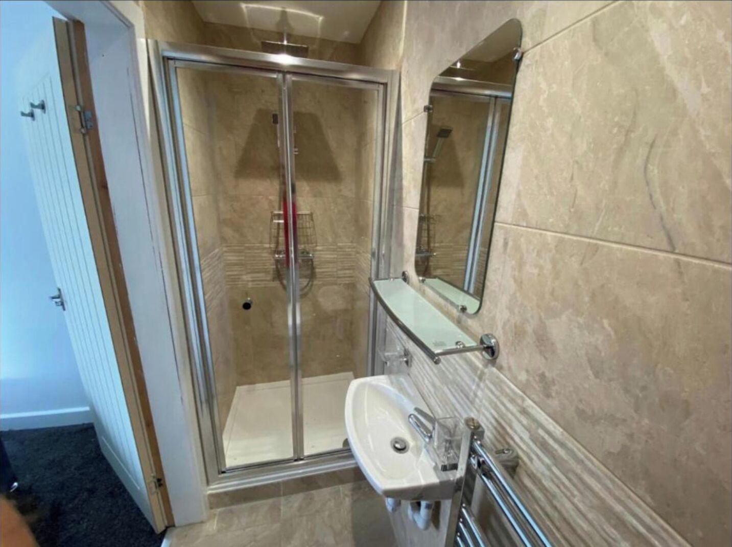 Combined shower/bathtub, hair dryer, towels, soap