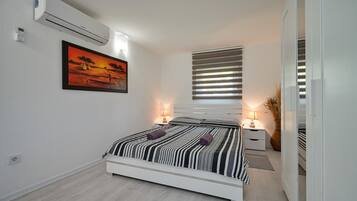 2 habitaciones, cuna de viaje, wifi gratis y ropa de cama