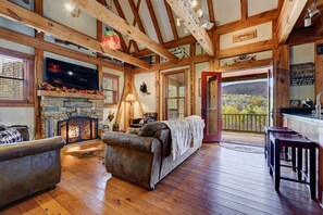 TV connectée, cheminée, jeux vidéo, lecteur de DVD