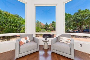 Smart TV, fireplace, books