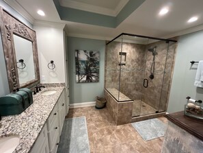 Combined shower/tub, hair dryer, towels, toilet paper