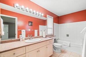 Combined shower/tub, towels, soap, toilet paper