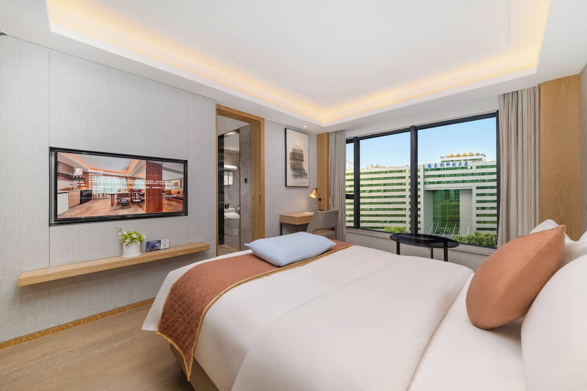 Ropa de cama de alta calidad y minibar