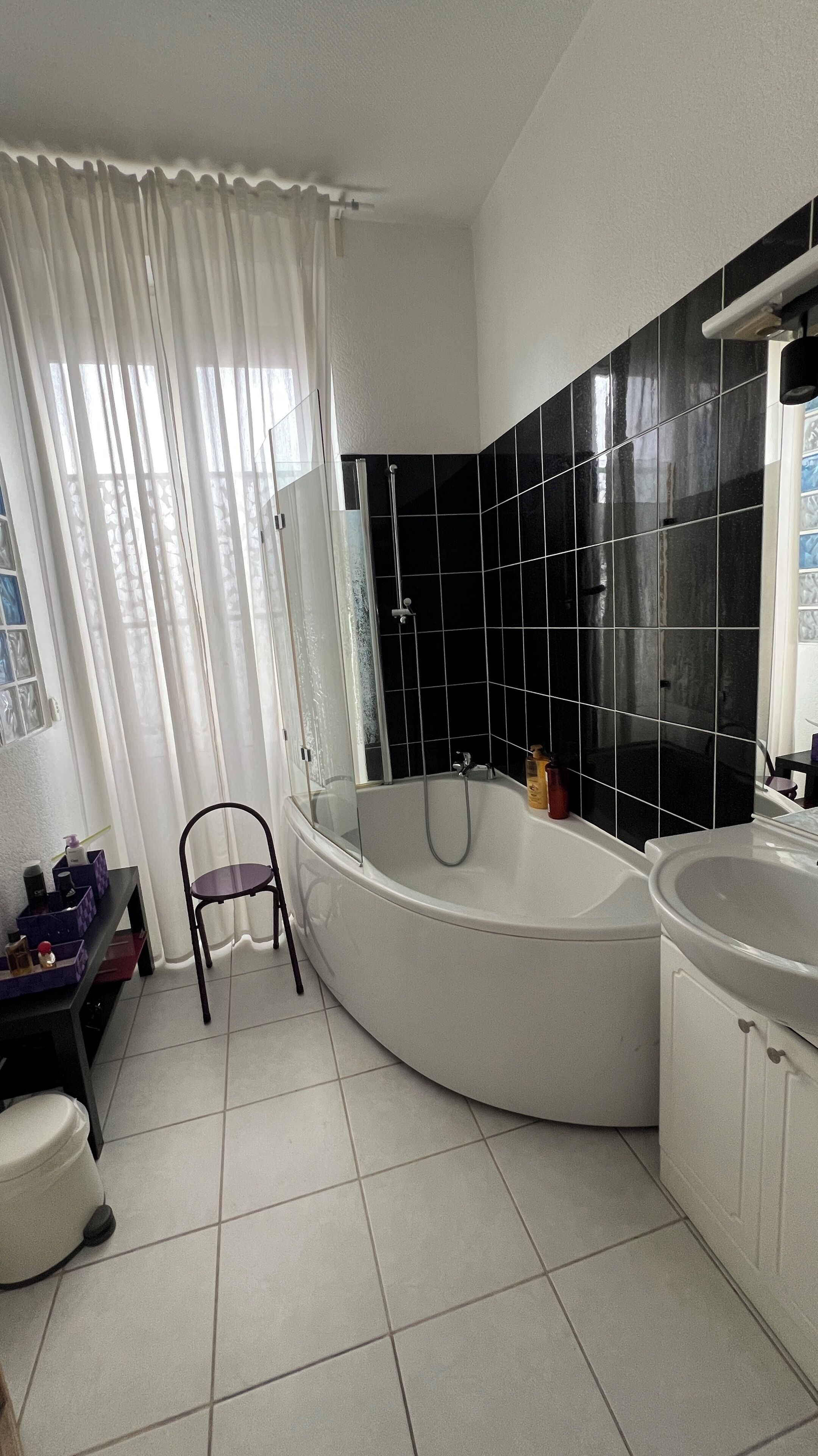 Combined shower/tub, hair dryer, towels, soap