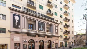A multi-story building with a sign reading "TEATRO S. FERDINANDO". - Terrazza San Ferdinando, Napoli (Naples)